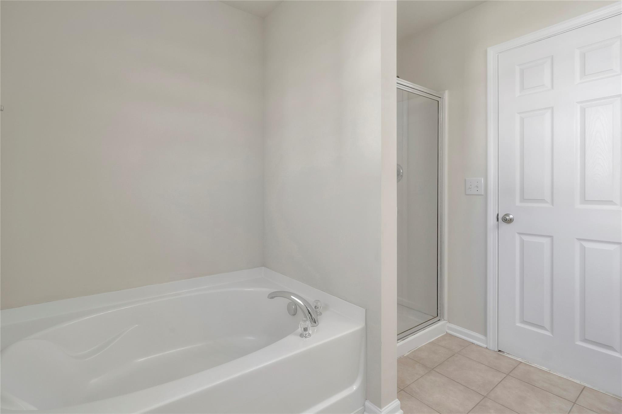 3008 Clover Road Northwest Concord, NC 28027 - Photo 25 of 45 a white bath tub sitting in a bathroom