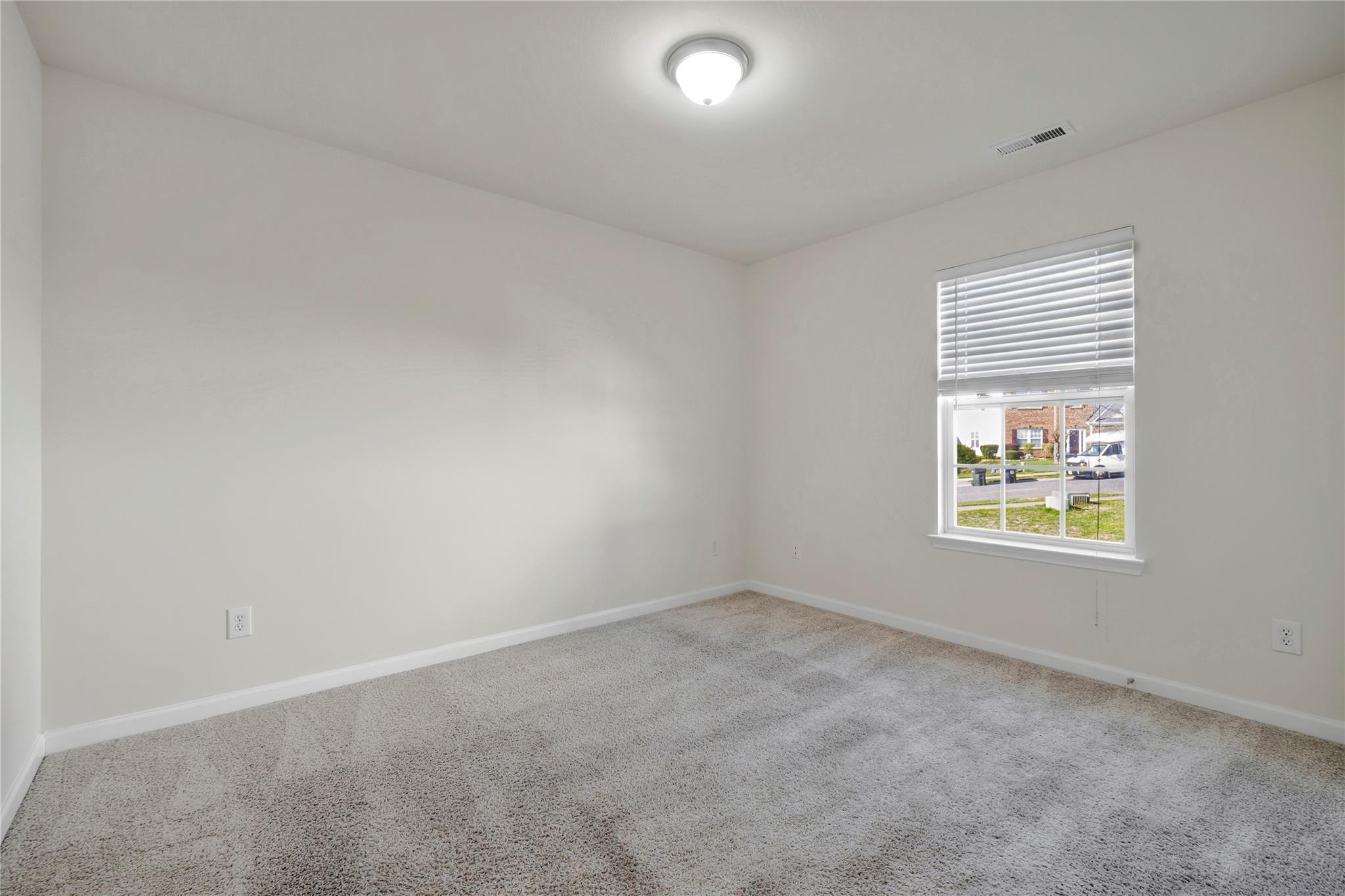 3008 Clover Road Northwest Concord, NC 28027 - Photo 28 of 45 an empty room with a window