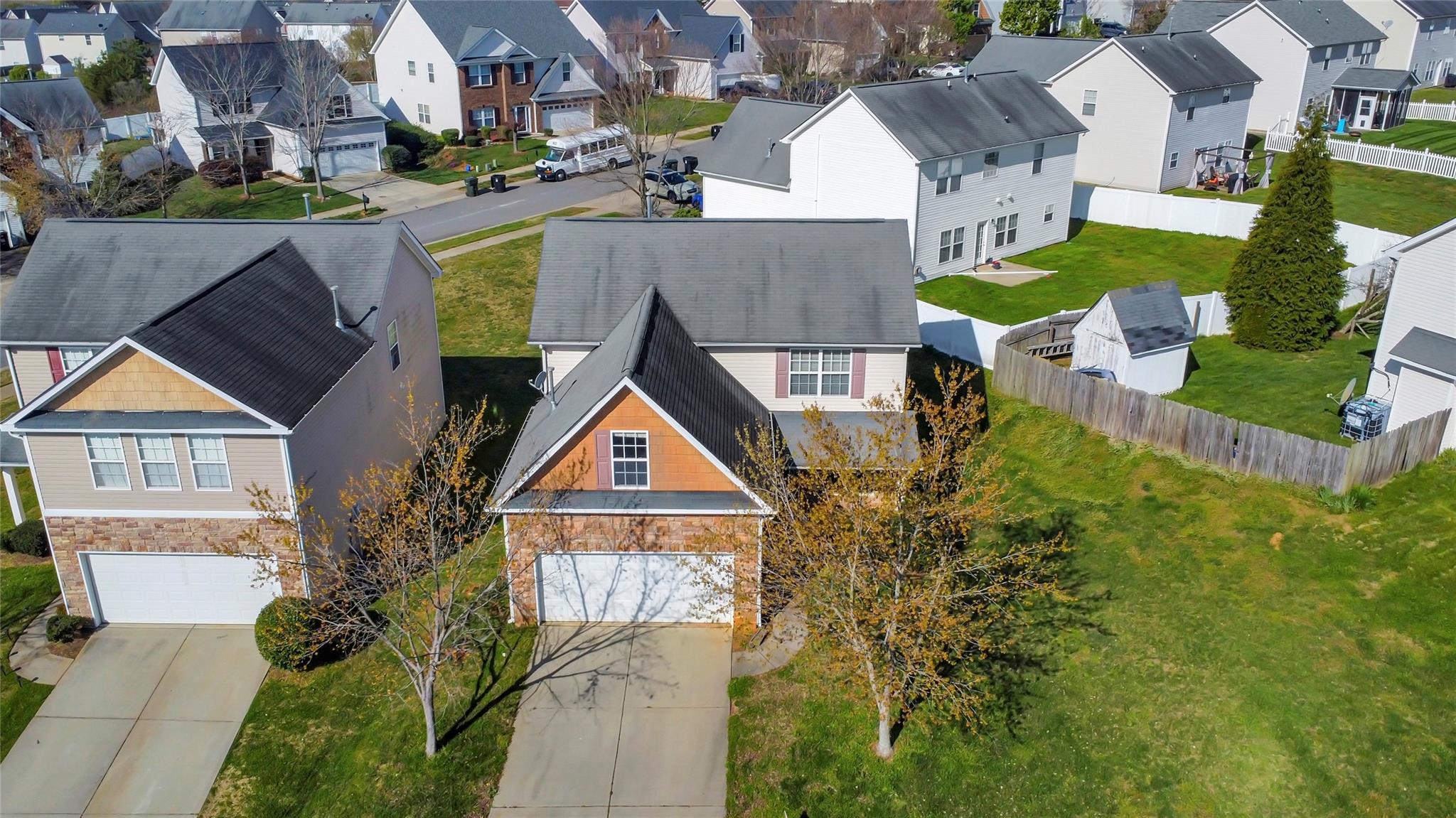 3008 Clover Road Northwest Concord, NC 28027 - Photo 3 of 45 an aerial view of residential houses with yard