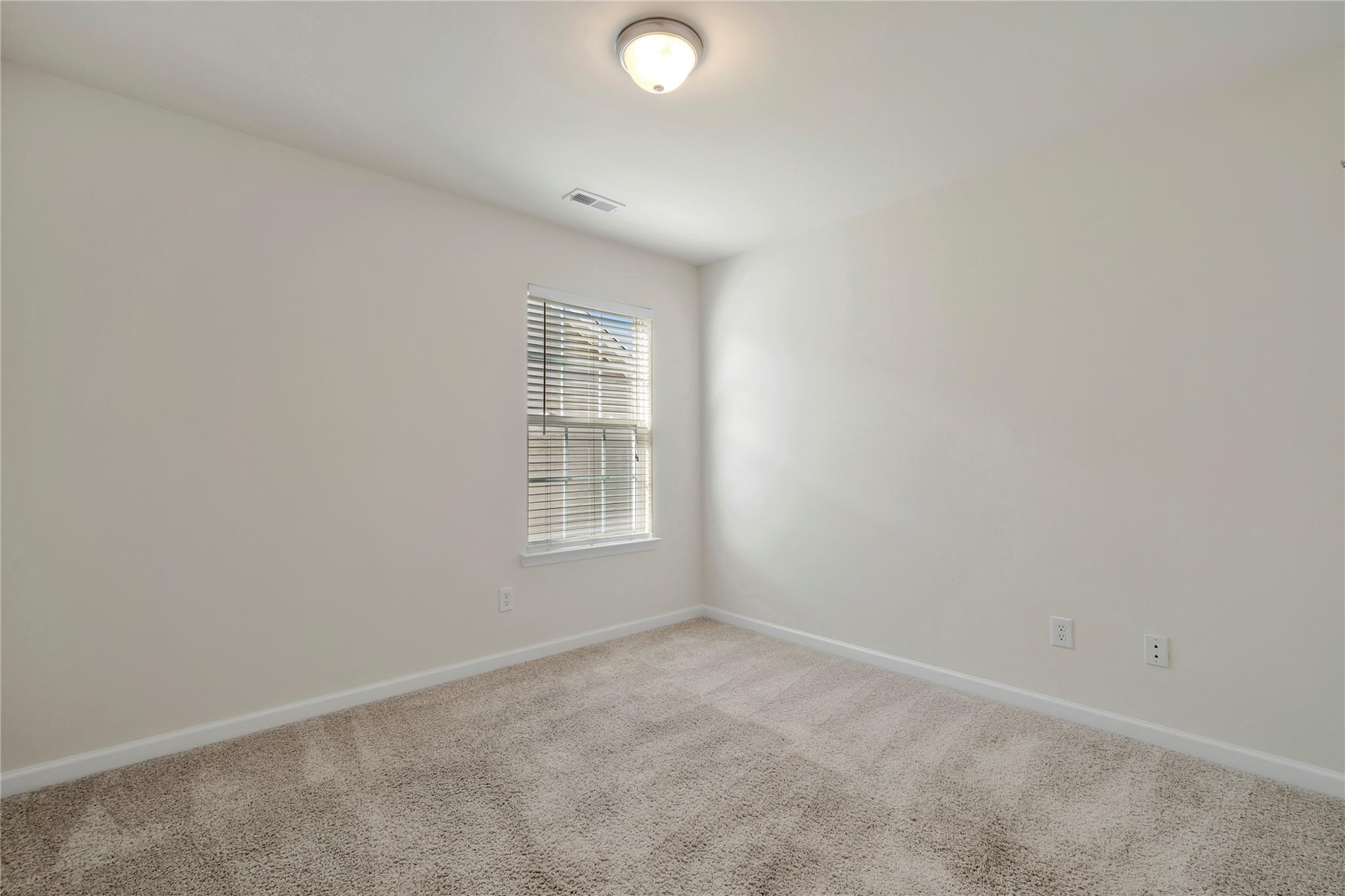 3008 Clover Road Northwest Concord, NC 28027 - Photo 31 of 45 an empty room with a window