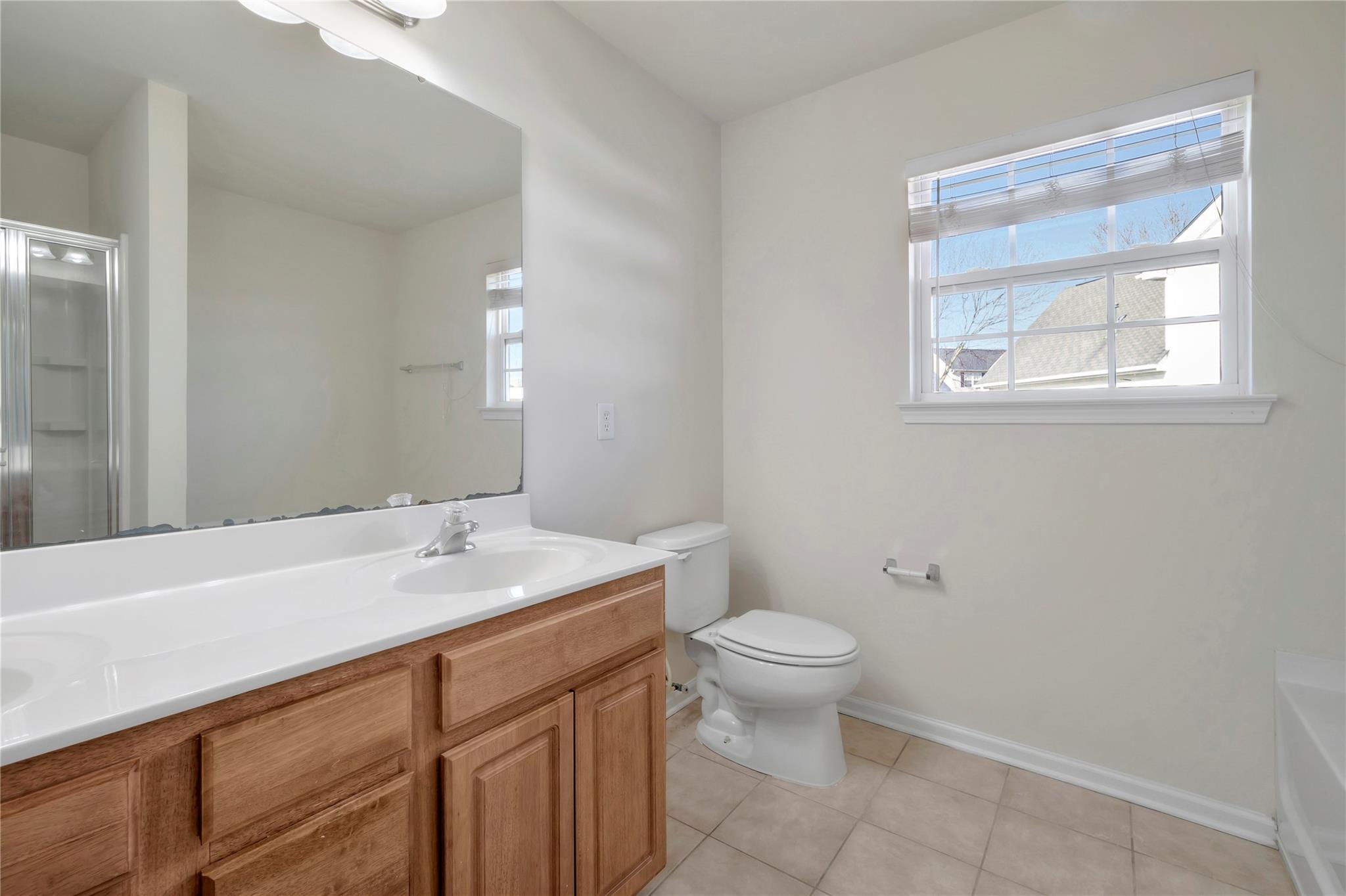 3008 Clover Road Northwest Concord, NC 28027 - Photo 33 of 45 a bathroom with a sink toilet and vanity