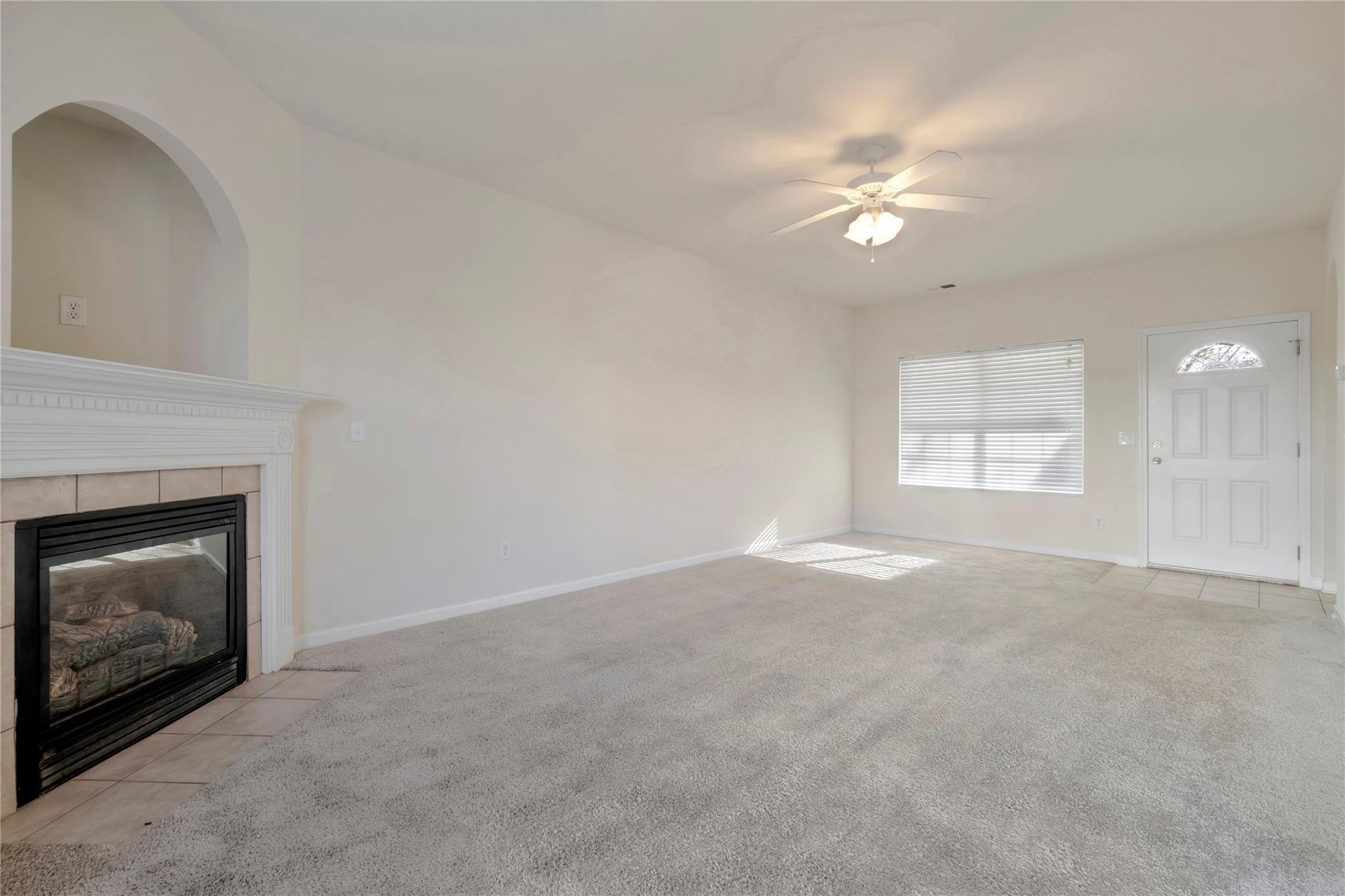 3008 Clover Road Northwest Concord, NC 28027 - Photo 10 of 45 a view of empty room with window and fireplace