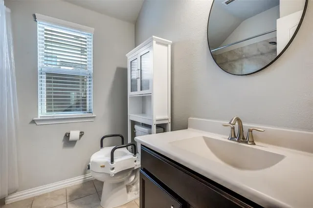 a bathroom with a sink and a toilet