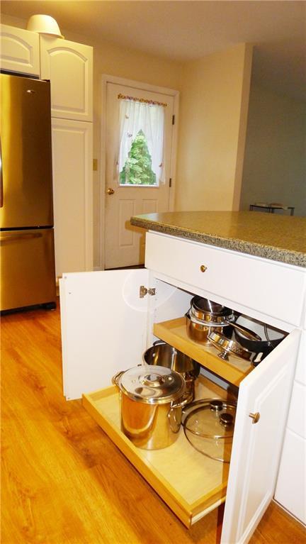 117 Old Lewiston Road Monmouth, ME 04265 - Photo 7 of 33 Pull-out shelves under the counter...