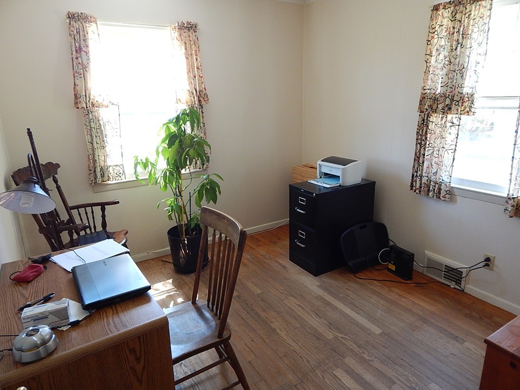 50 Searle Road South Hadley, MA 01075 - Photo 14 of 30 a living room with furniture and a potted plant