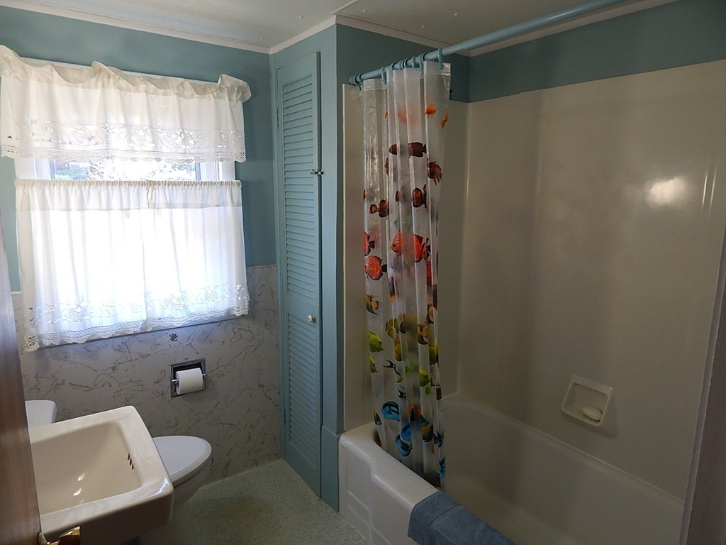 50 Searle Road South Hadley, MA 01075 - Photo 17 of 30 a bathroom with a shower and a toilet