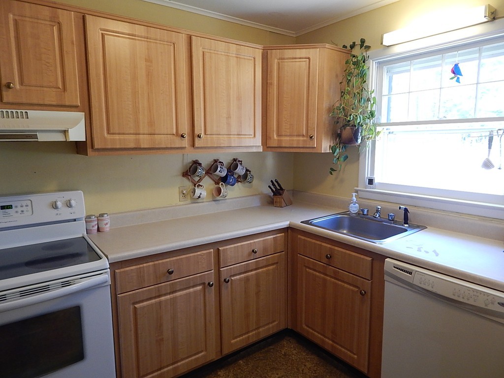 50 Searle Road South Hadley, MA 01075 - Photo 2 of 30 a kitchen with a sink cabinets and window