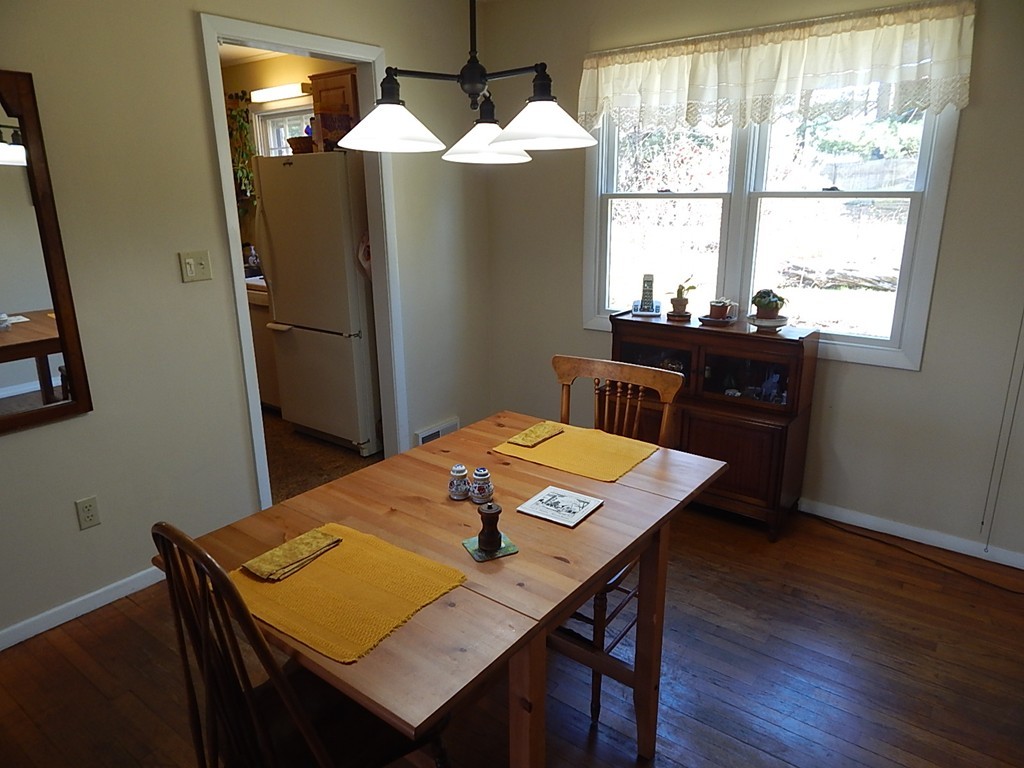50 Searle Road South Hadley, MA 01075 - Photo 4 of 30 a view of a dining room with furniture and window