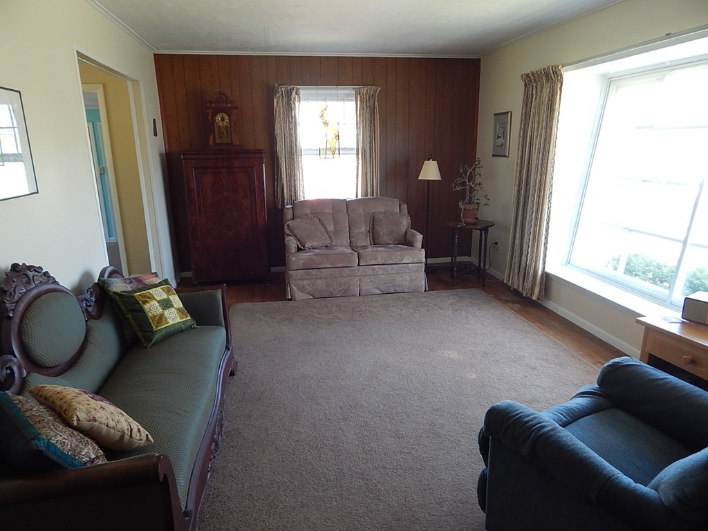 50 Searle Road South Hadley, MA 01075 - Photo 9 of 30 a living room with furniture and a window