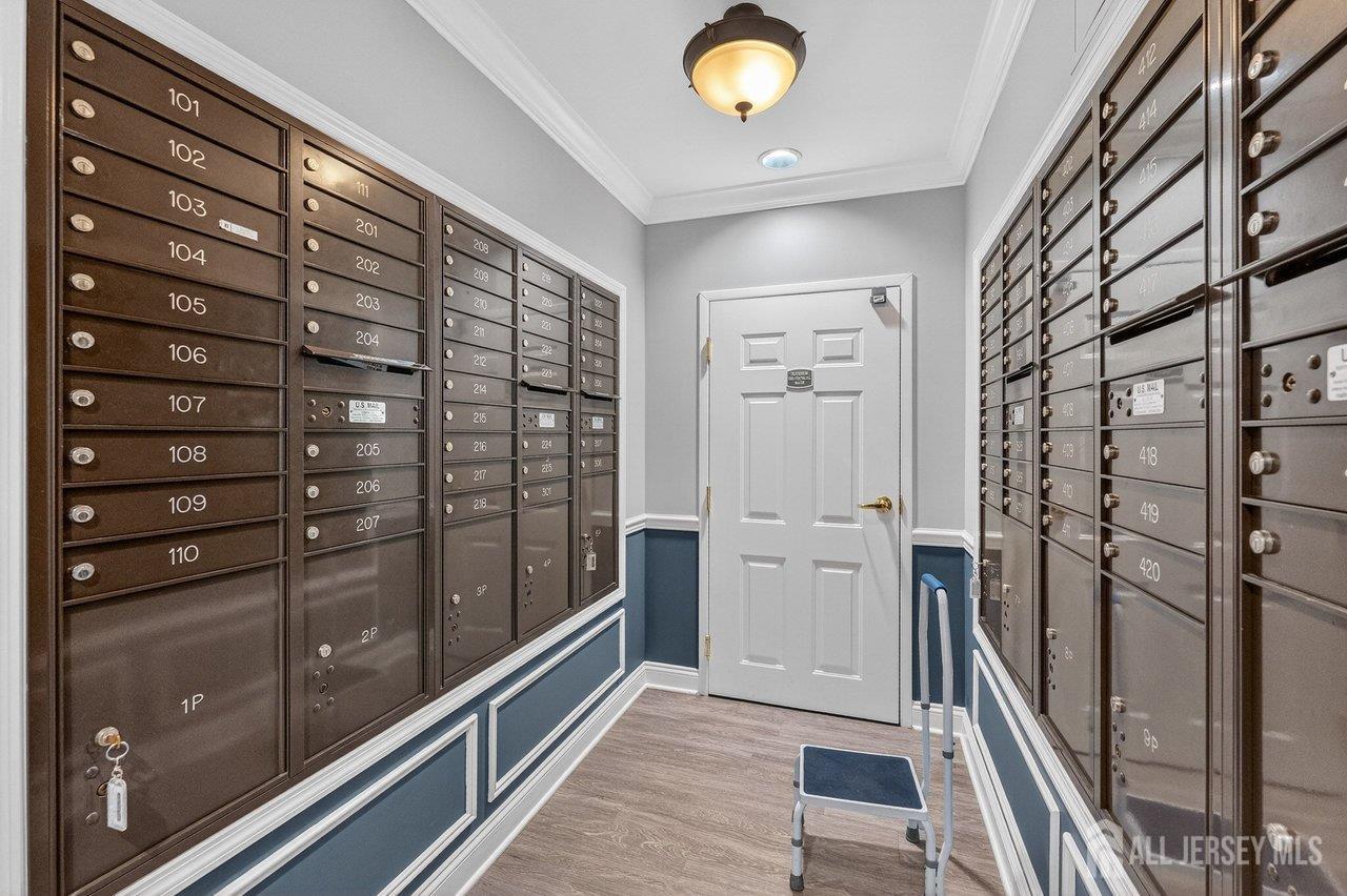 417 Regency Place Woodbridge, NJ 07095 - Photo 26 of 28 a view of walk in closet with empty racks
