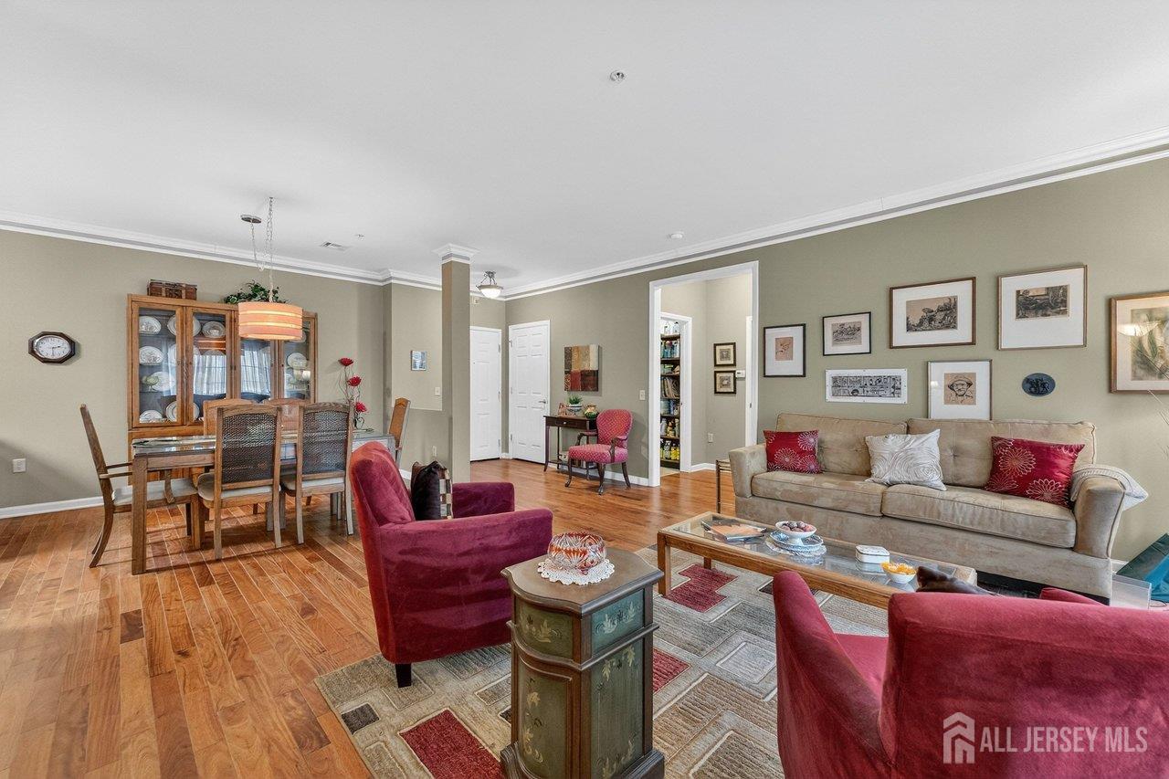 417 Regency Place Woodbridge, NJ 07095 - Photo 5 of 28 a living room with furniture and wooden floor