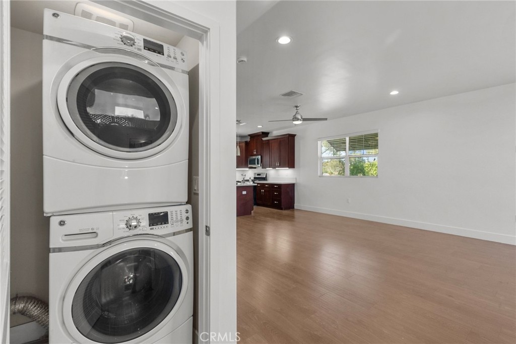 16863 Balboa Boulevard Van Nuys, CA 91406 - Photo 16 of 34 a view of a hallway with washer and dryer