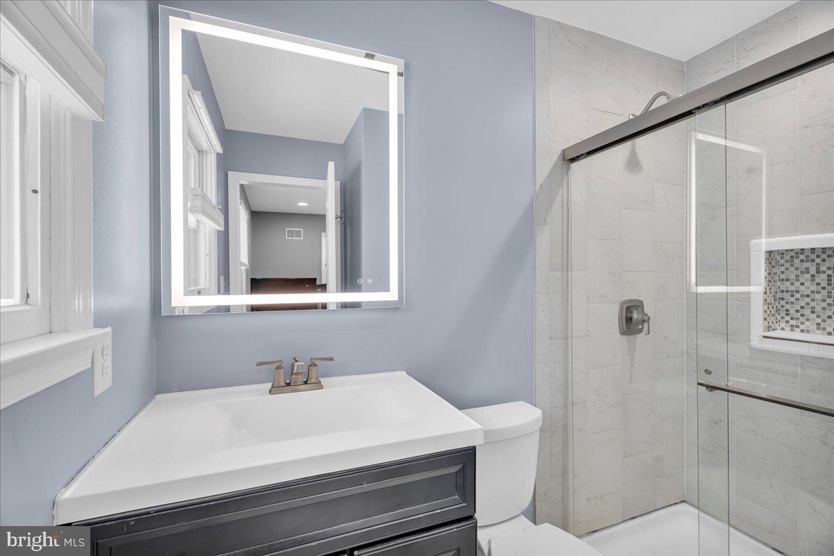 114 Peach Road Marlton, NJ 08053 - Photo 20 of 46 a bathroom with a sink a toilet and shower