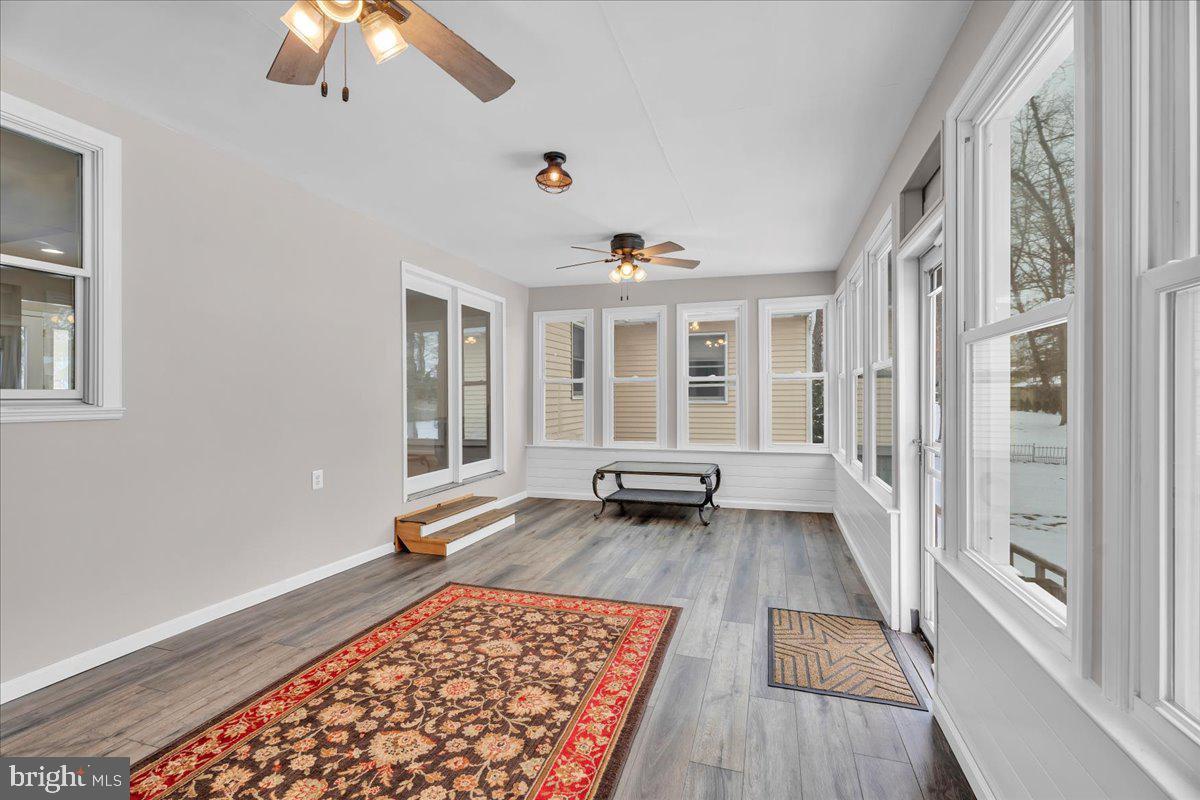 114 Peach Road Marlton, NJ 08053 - Photo 24 of 46 a living room with furniture and a rug