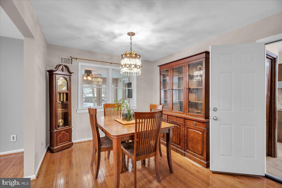 114 Peach Road Marlton, NJ 08053 - Photo 7 of 46 a view of a dining room with furniture and chandelier