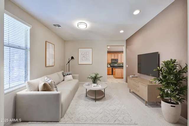 a dining room with furniture and window
