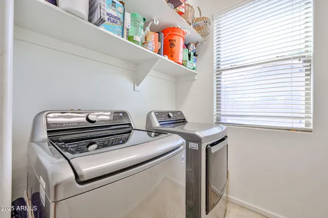 a view of a backyard with sitting area