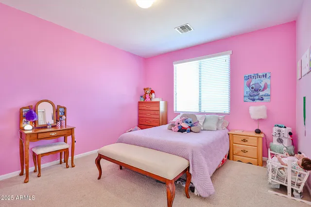 a workspace with a bookshelf and a workspace