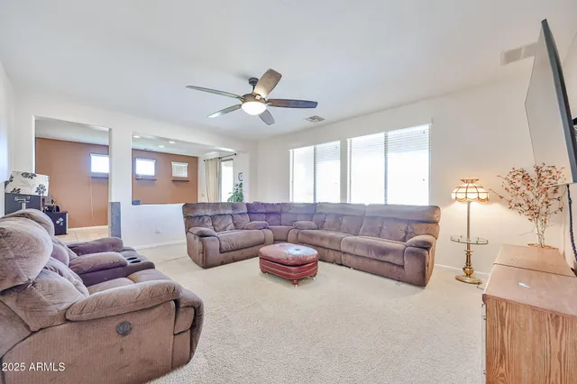a kitchen with stainless steel appliances granite countertop a refrigerator sink and cabinets