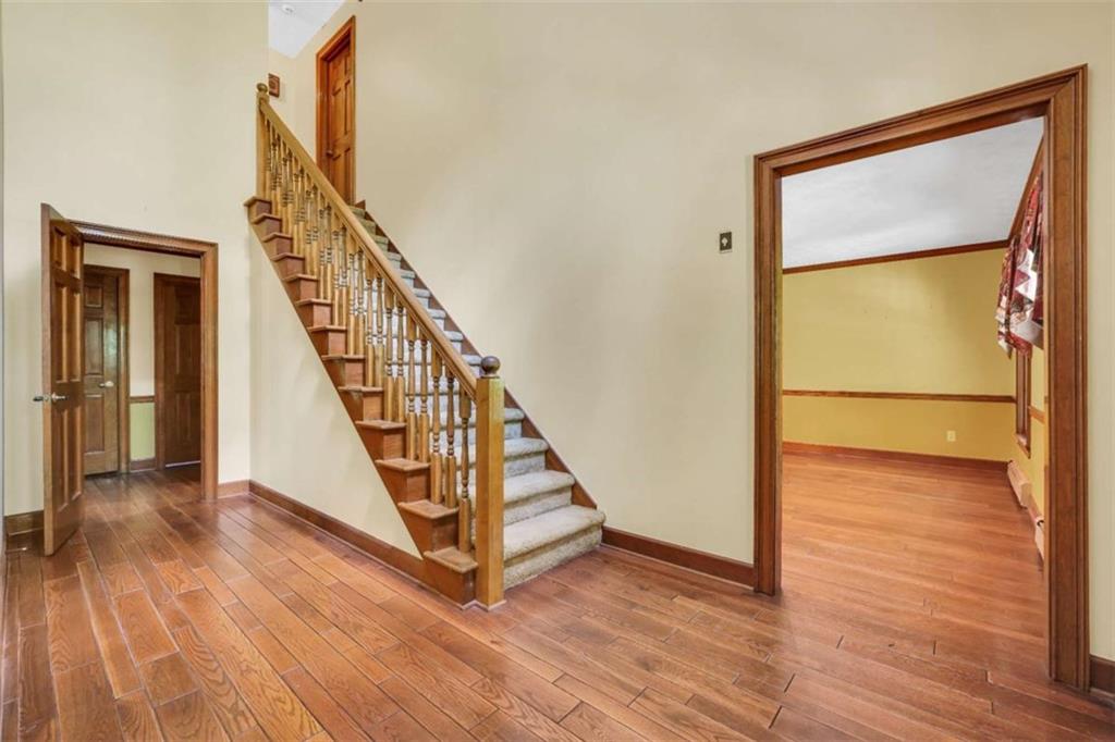 314 Winding Stream Trail Southwest Conyers, GA 30094 - Photo 4 of 59 a view of an entryway with wooden floor