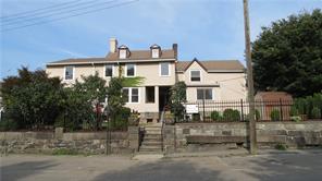 2 Depot Square, Unit A Cold Spring, NY 10516 - Photo 1 of 1 a front view of a house with a yard