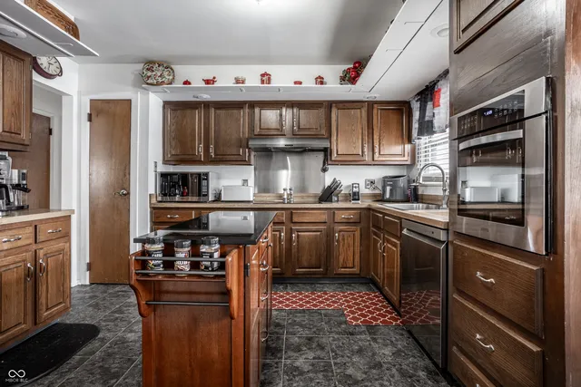 $310,000 | 7802 Fall Creek Road, Indianapolis, IN 46256