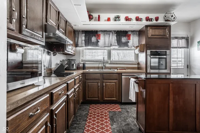 $310,000 | 7802 Fall Creek Road, Indianapolis, IN 46256