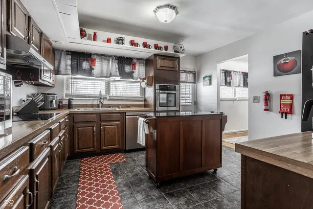 $310,000 | 7802 Fall Creek Road, Indianapolis, IN 46256