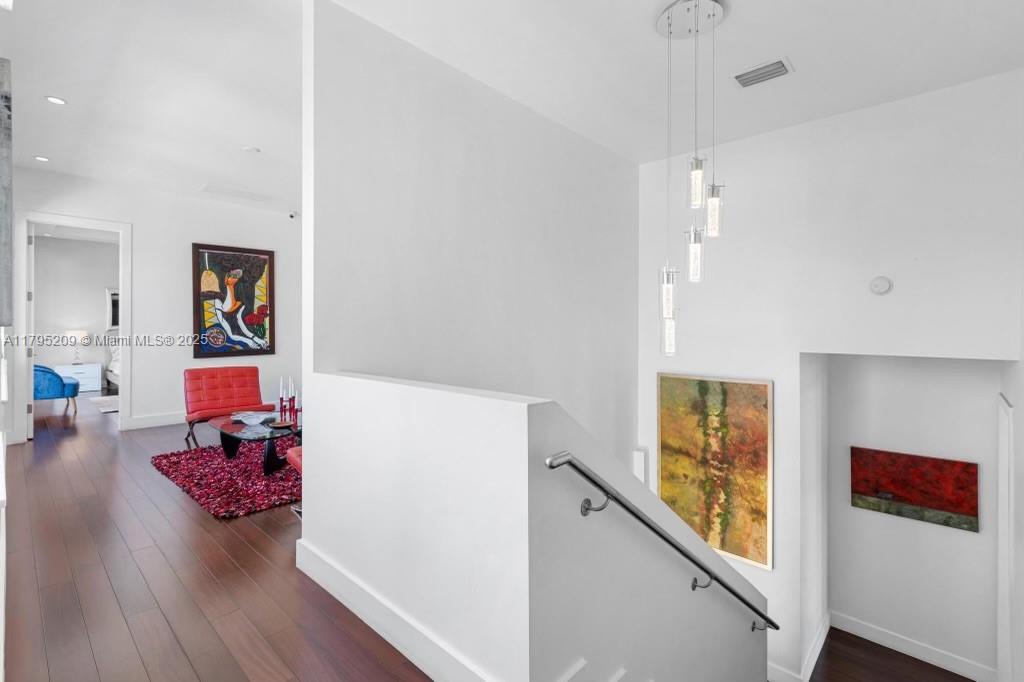 689 Glenridge Road Key Biscayne, FL 33149 - Photo 23 of 48 a living room with furniture and wooden floor
