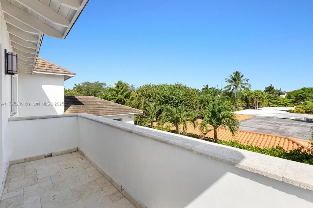 689 Glenridge Road Key Biscayne, FL 33149 - Photo 27 of 48 a view of a balcony with an outdoor space