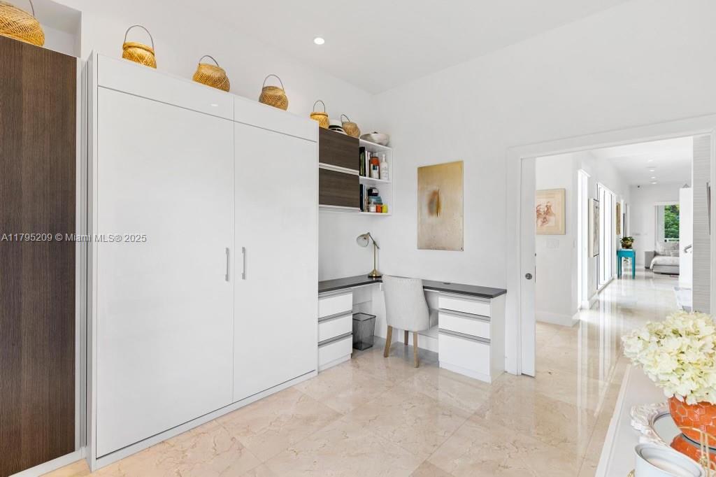 689 Glenridge Road Key Biscayne, FL 33149 - Photo 39 of 48 a white refrigerator freezer and a stove sitting inside of a kitchen