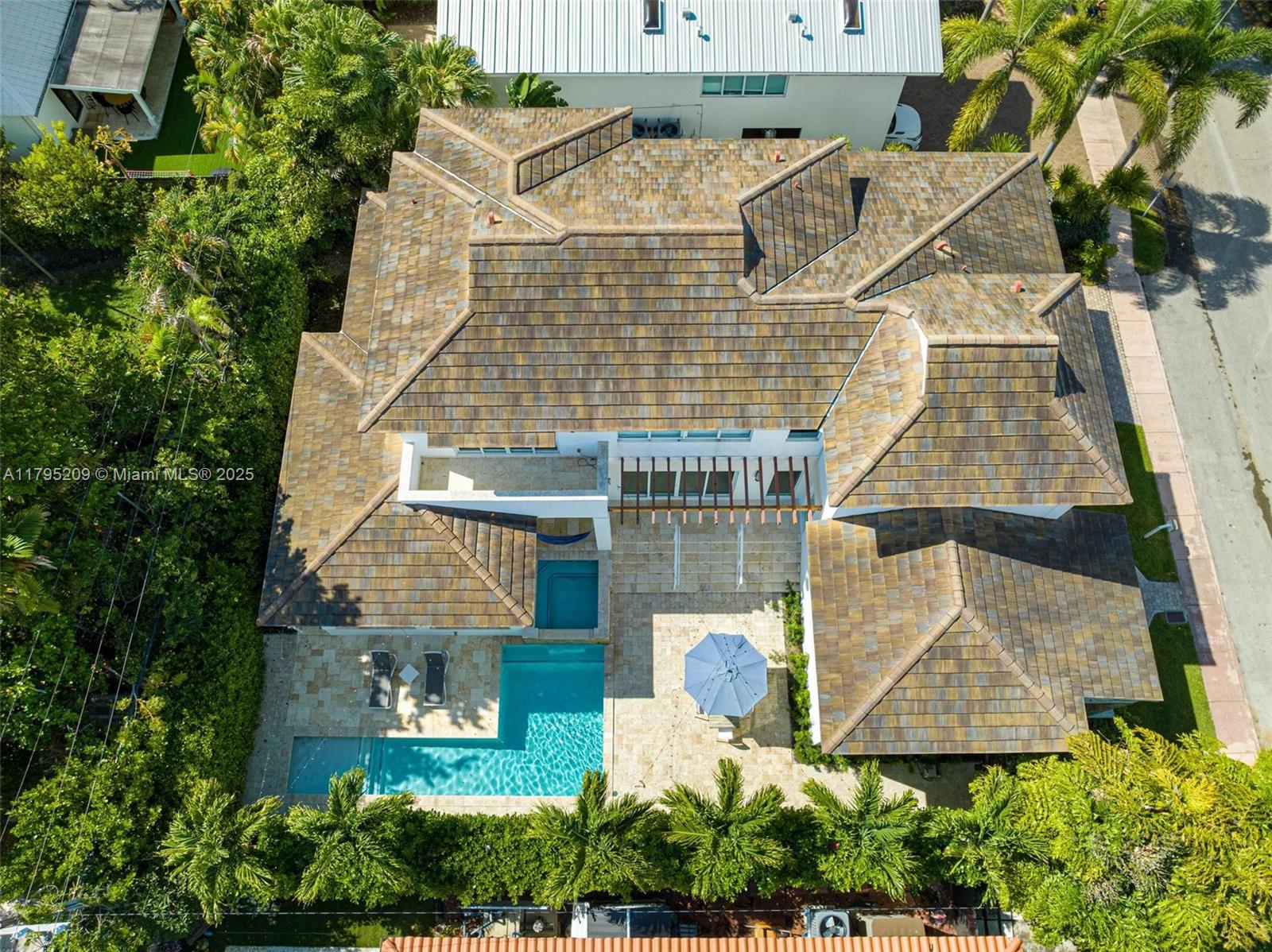 689 Glenridge Road Key Biscayne, FL 33149 - Photo 6 of 48 an aerial view of a house