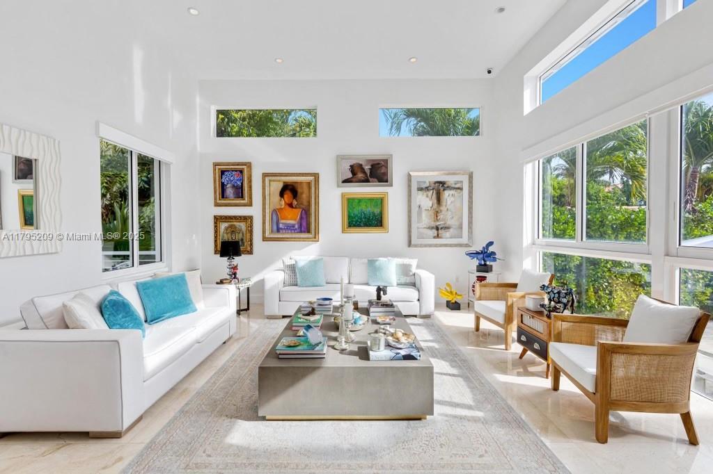 689 Glenridge Road Key Biscayne, FL 33149 - Photo 8 of 48 a living room with furniture fireplace and window