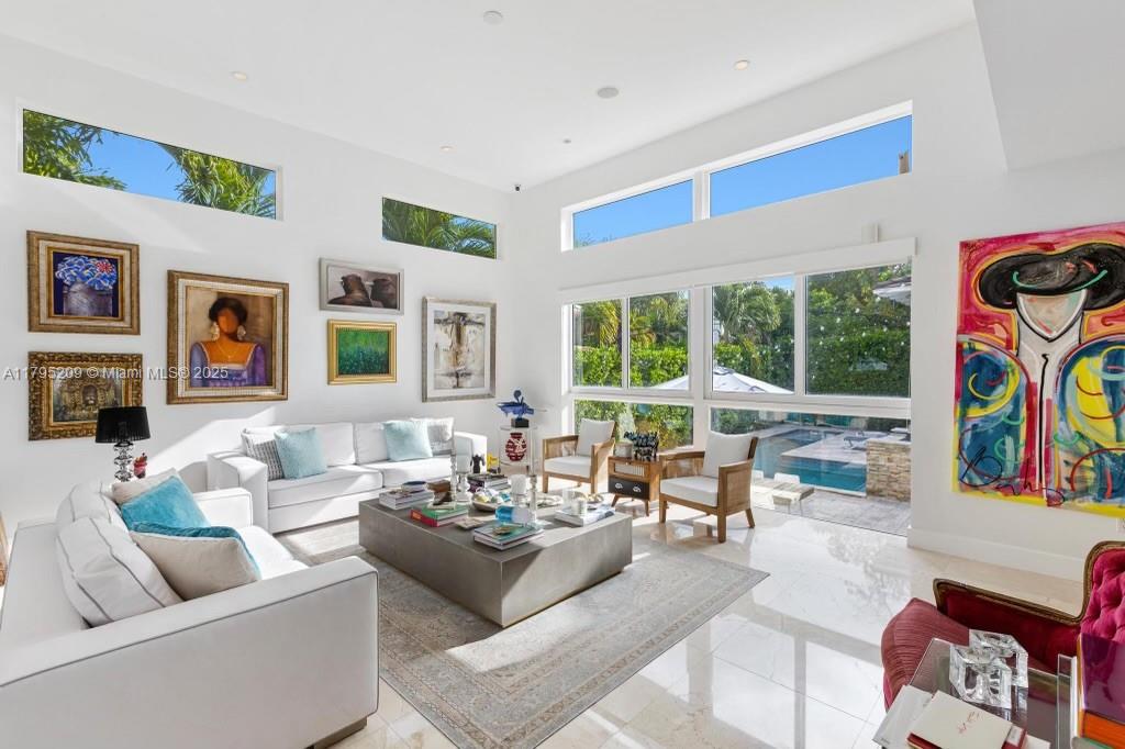 689 Glenridge Road Key Biscayne, FL 33149 - Photo 9 of 48 a living room with furniture and a large window