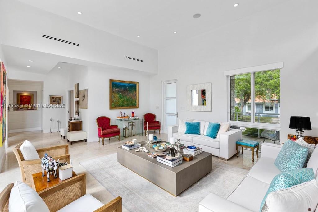 689 Glenridge Road Key Biscayne, FL 33149 - Photo 10 of 48 a living room with furniture rug and window