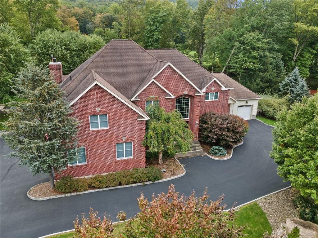 7 Grandview Road Central Valley, NY 10917 - Photo 1 of 1 a front view of a house with a yard and garage