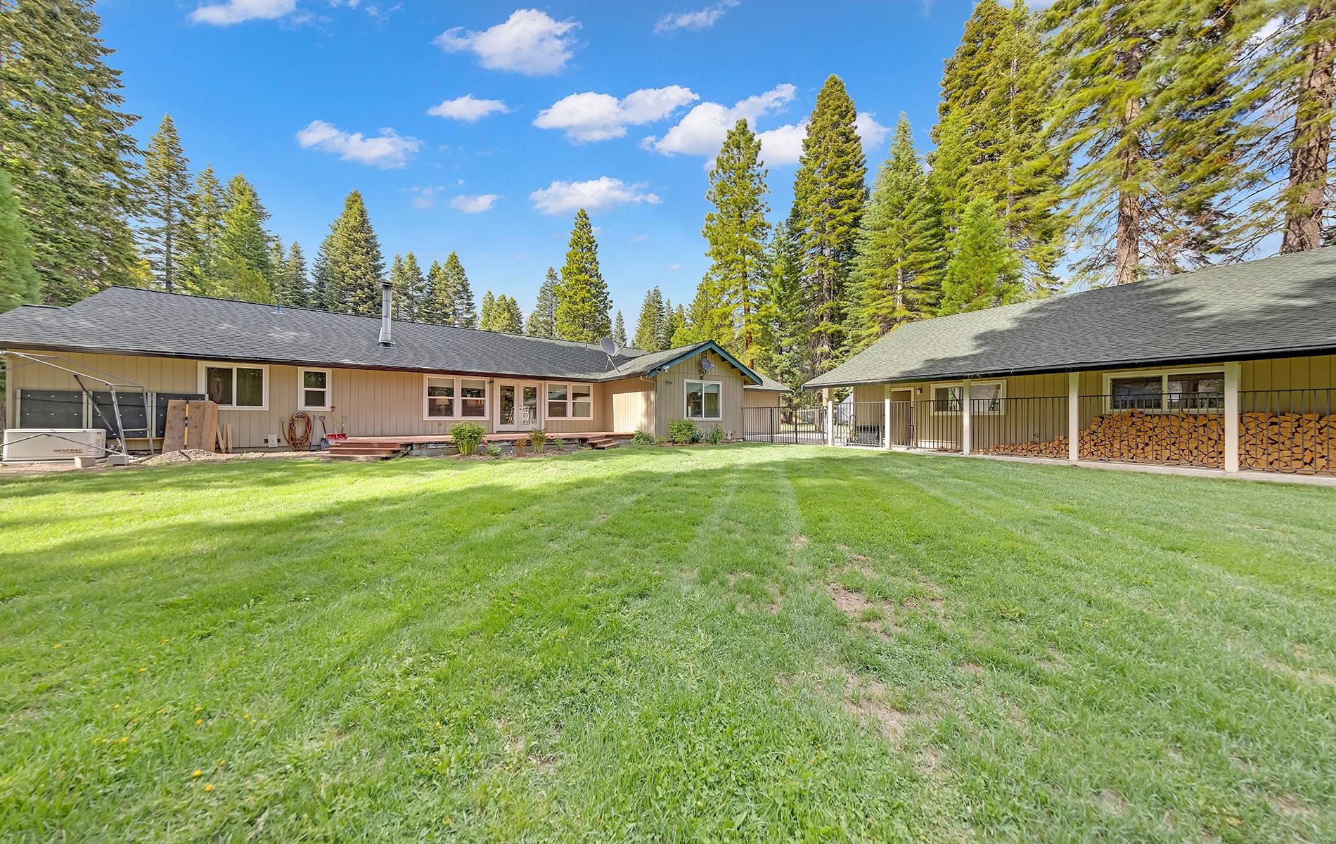 650 Wagon Road Chester, CA 96020 - Photo 30 of 36 a view of house with a yard and potted plants