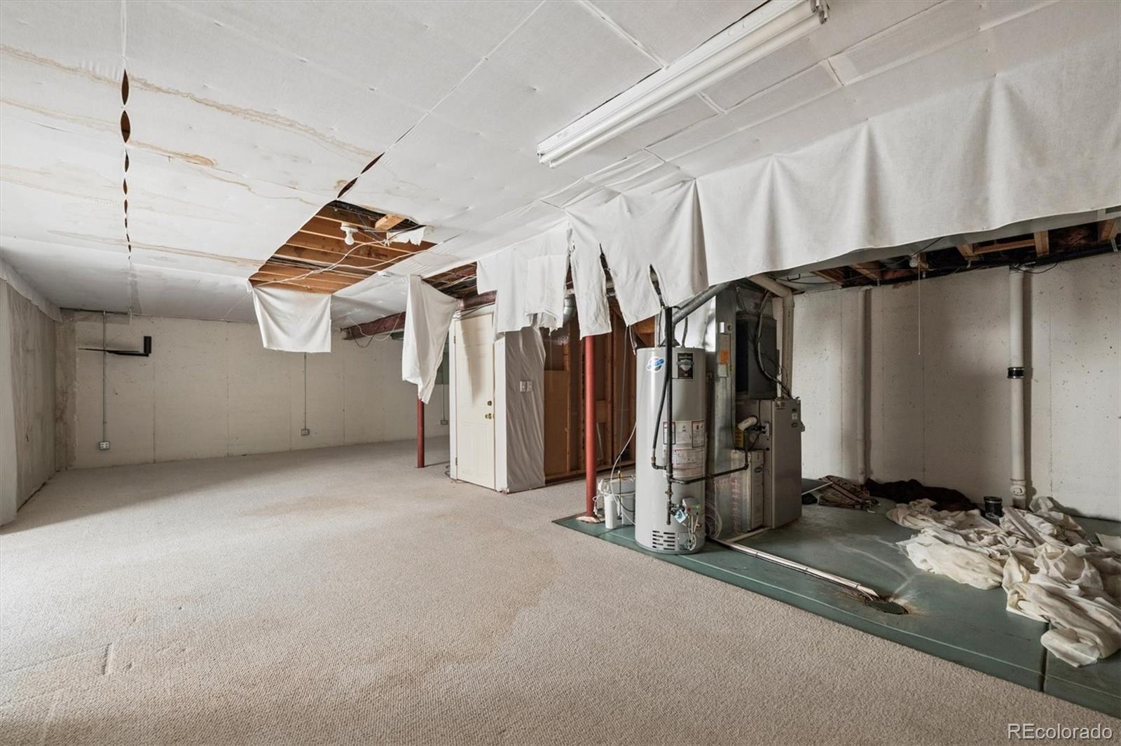 8554 Redstone Street Highlands Ranch, CO 80126 - Photo 26 of 33 a view of a room with gym equipment