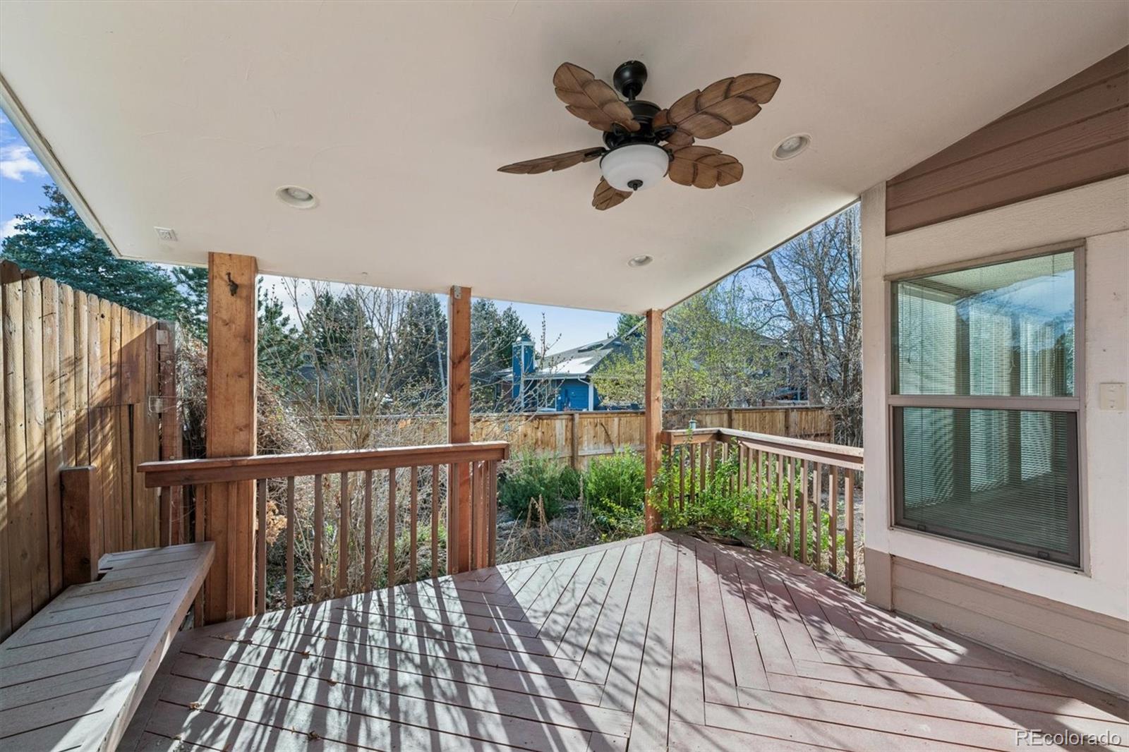 8554 Redstone Street Highlands Ranch, CO 80126 - Photo 27 of 33 a view of a balcony with wooden floor