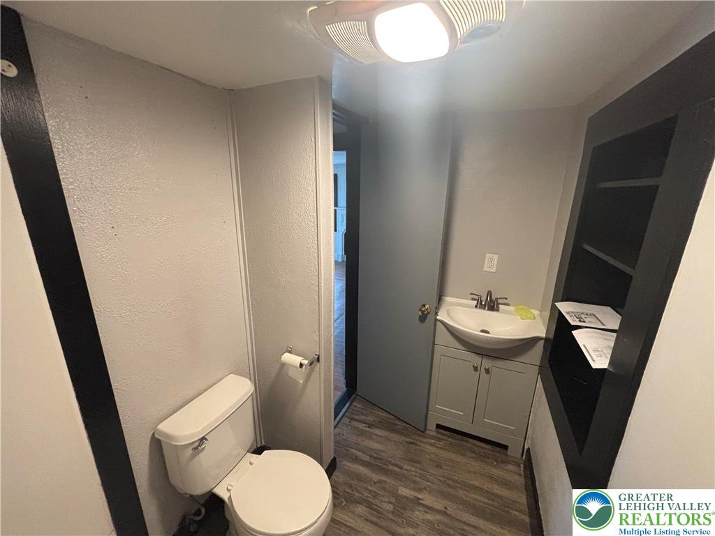 654 Youngs Hill Road Easton, PA 18040 - Photo 13 of 36 a bathroom with a sink and toilet