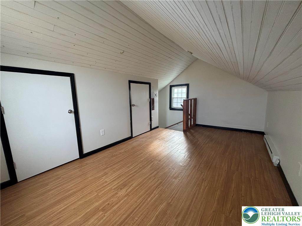 654 Youngs Hill Road Easton, PA 18040 - Photo 21 of 36 a view of empty room with wooden floor