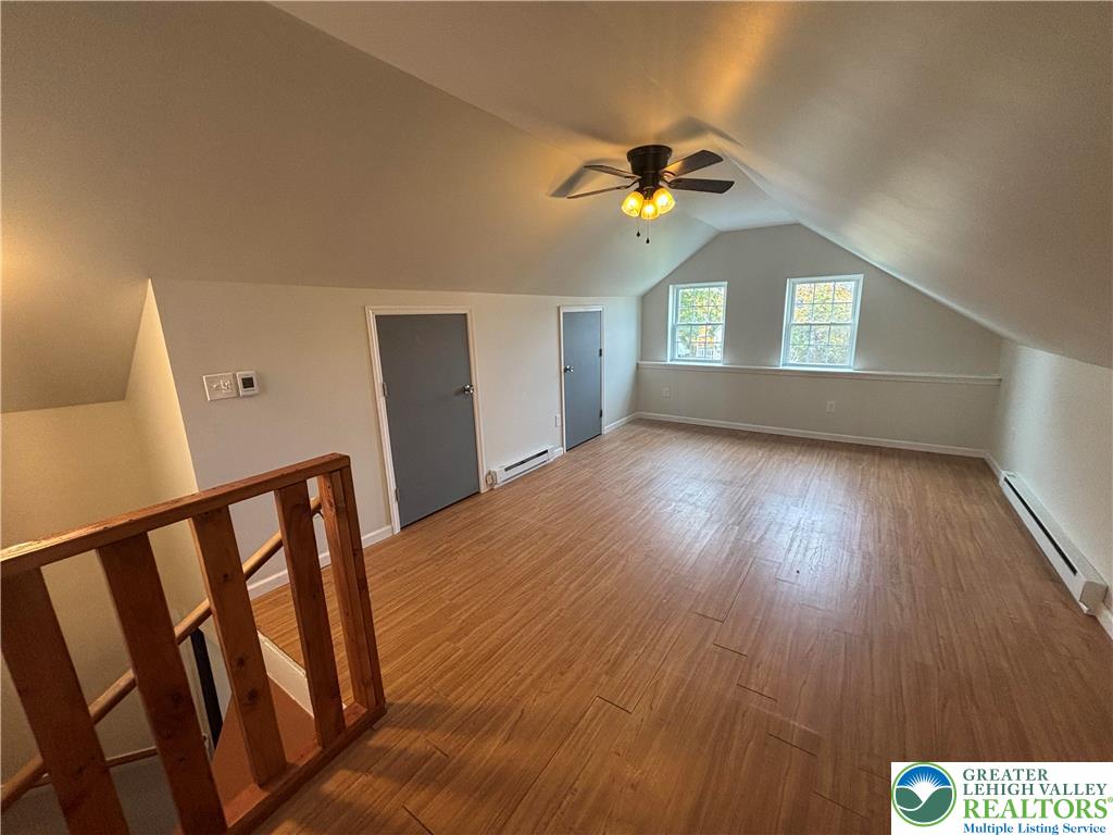 654 Youngs Hill Road Easton, PA 18040 - Photo 22 of 36 a view of an entryway wooden floor and a ceiling fan