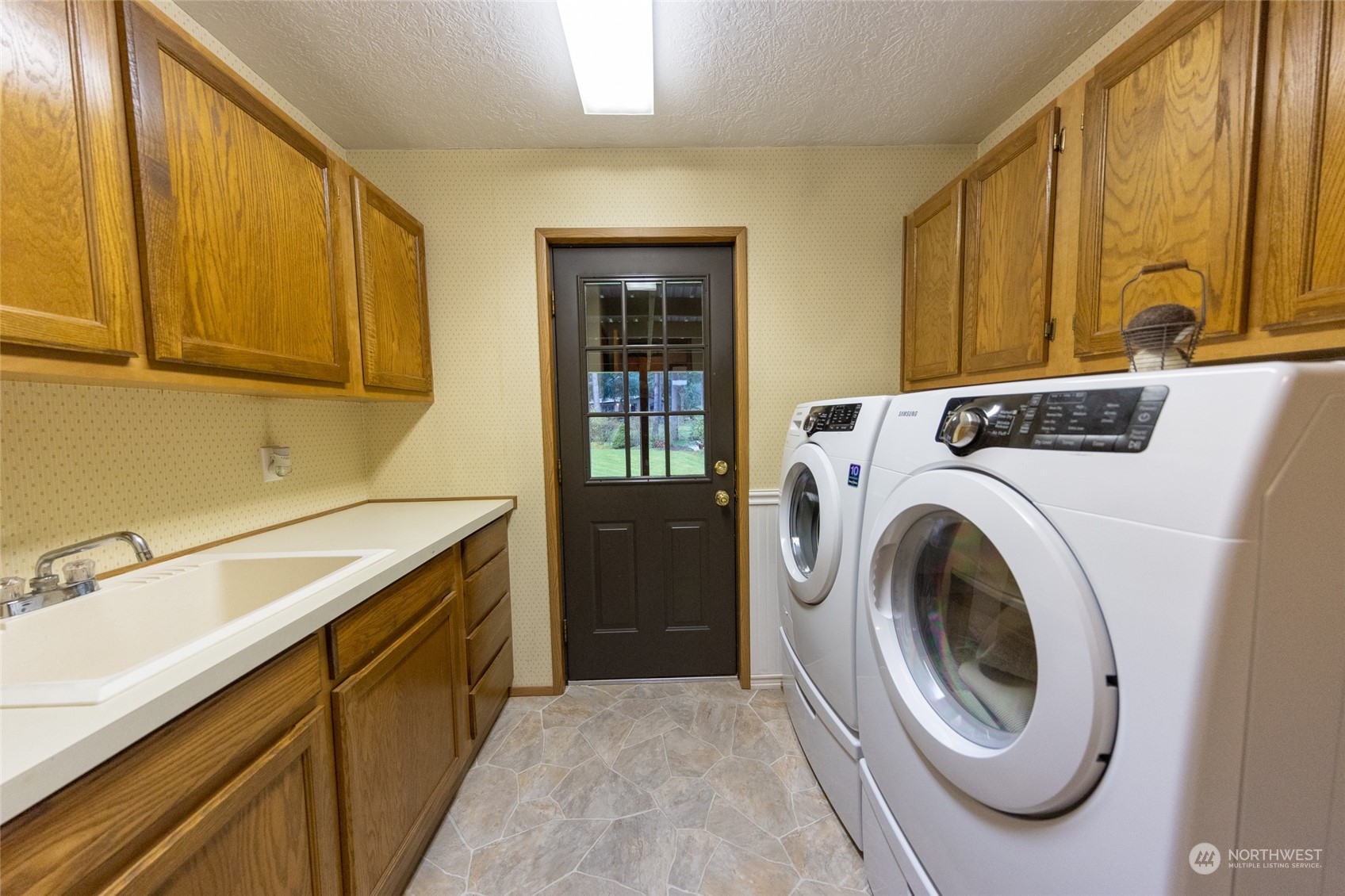 8143 191st Avenue Southwest Rochester, WA 98579 - Photo 16 of 32 a utility room with dryer and washer