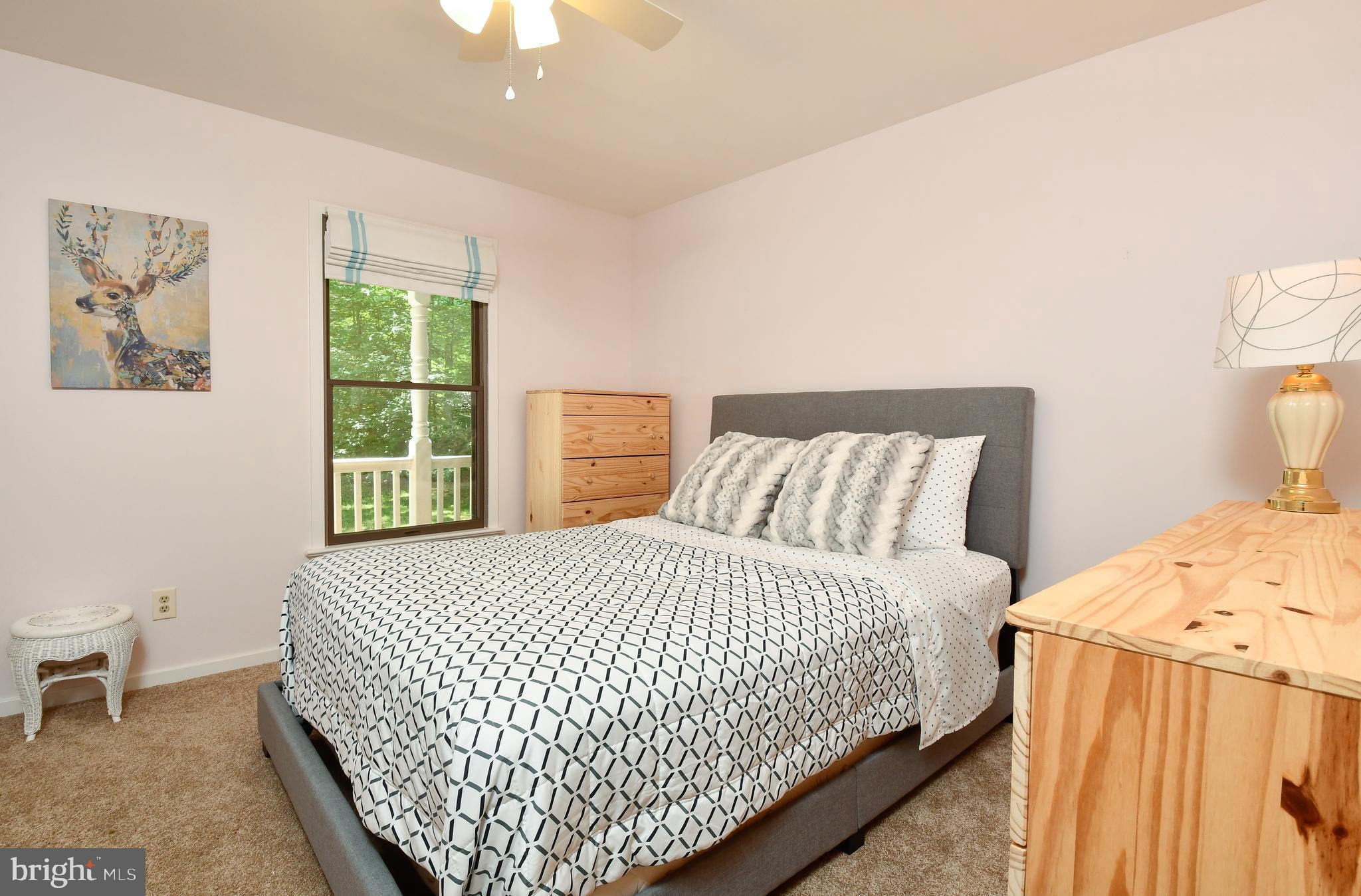 35 Tomahawk Circle Mineral, VA 23117 - Photo 12 of 25 a bedroom with a bed and painting on the wall
