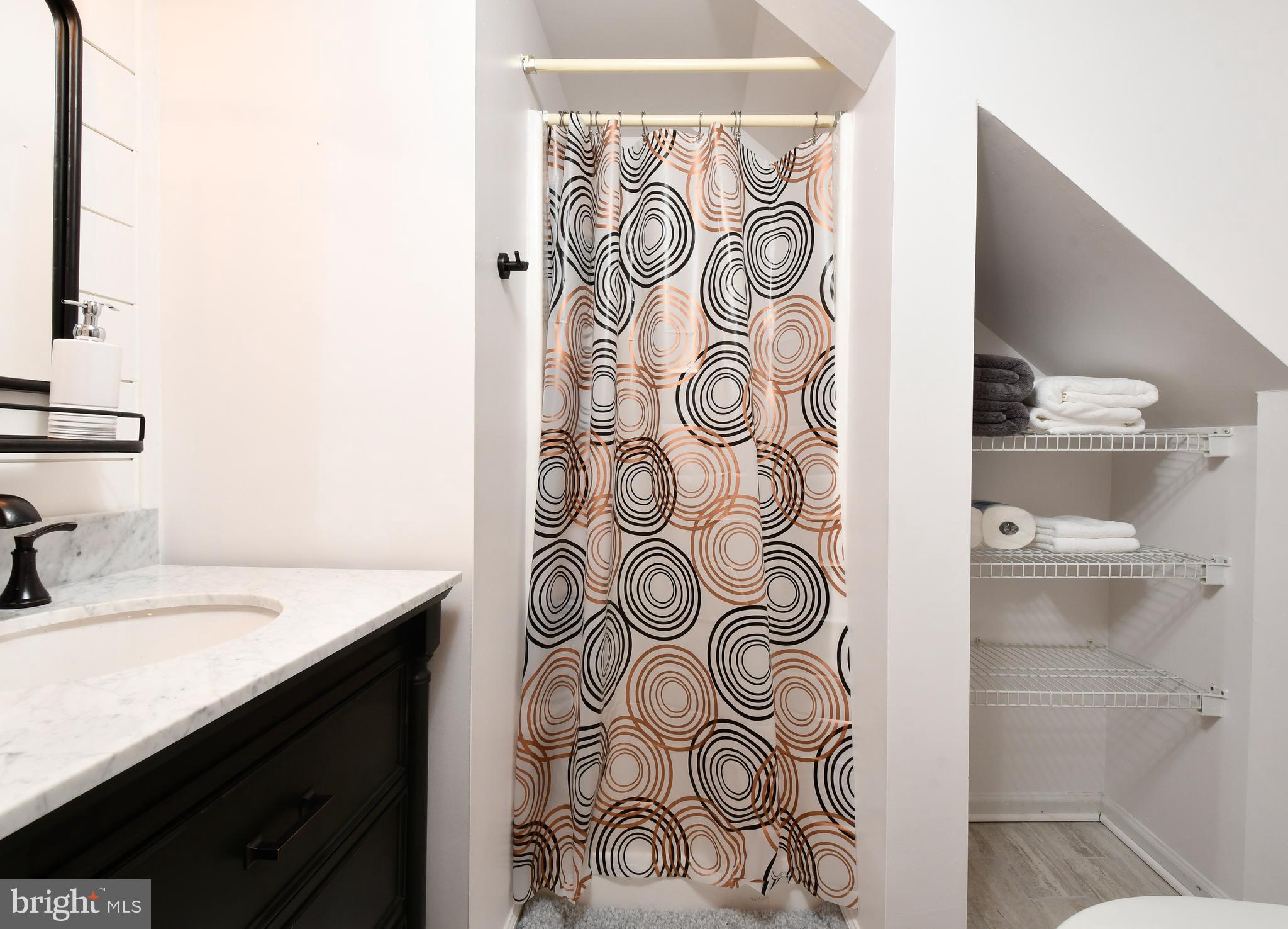 35 Tomahawk Circle Mineral, VA 23117 - Photo 20 of 25 a bathroom with a sink and a mirror