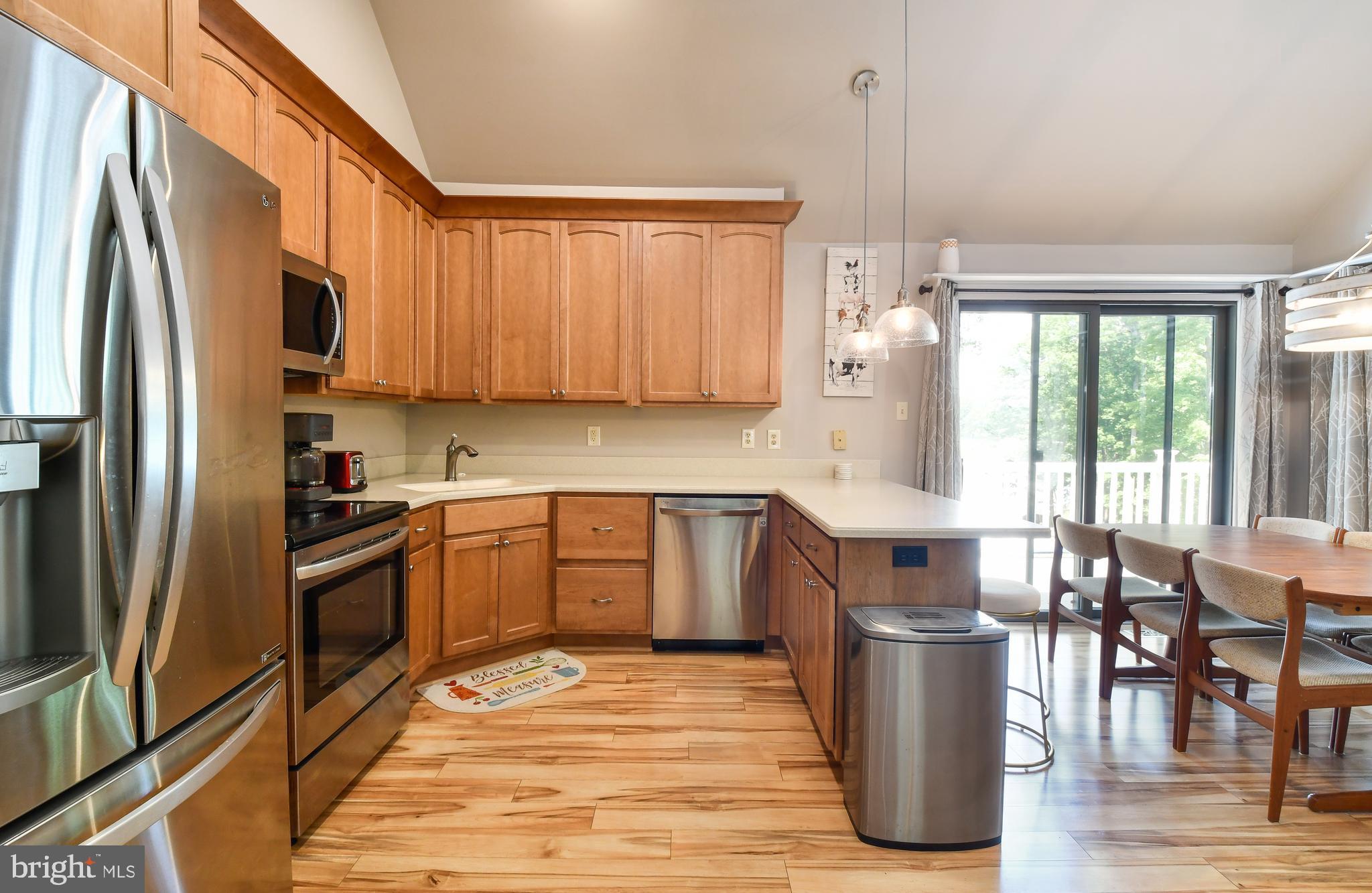 35 Tomahawk Circle Mineral, VA 23117 - Photo 22 of 25 a kitchen with stainless steel appliances granite countertop a refrigerator sink and stove
