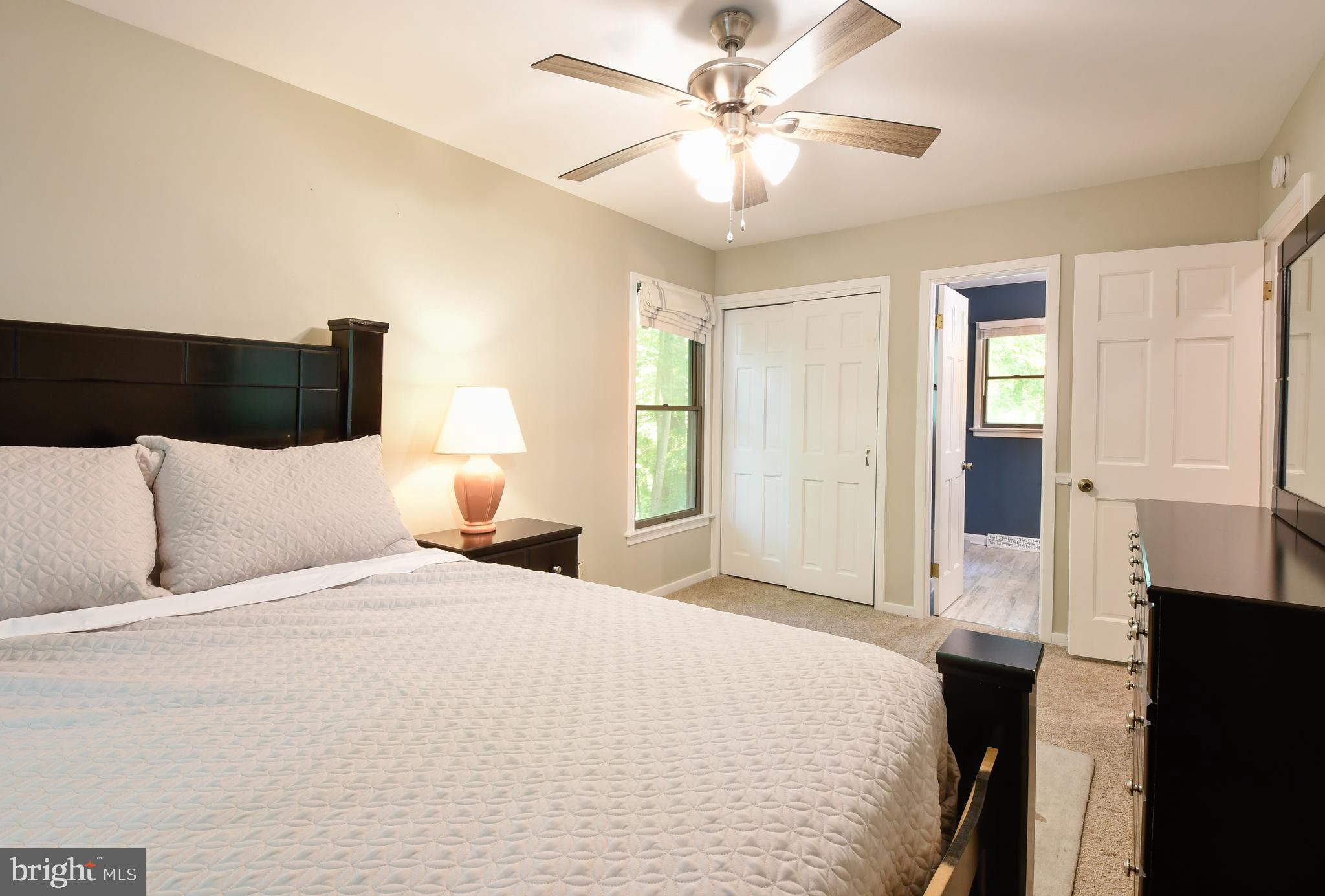 35 Tomahawk Circle Mineral, VA 23117 - Photo 7 of 25 a bedroom with a bed and a chandelier