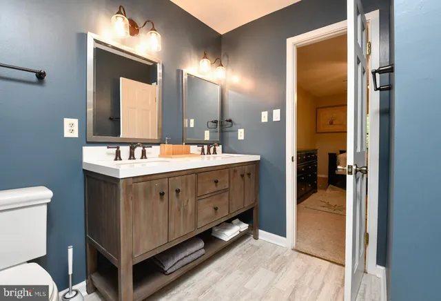a bathroom with a shower and a bath tub