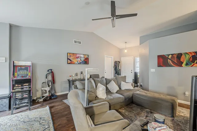 a kitchen with refrigerator and stove