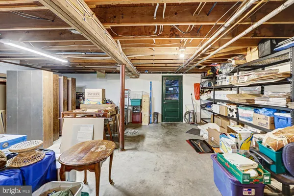 a view of a storage room with furniture